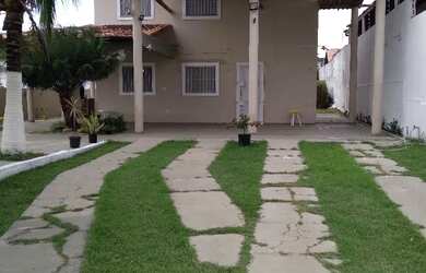 Imagem: A casa possui 3 Dormitórios, 4 Banheiros, 5 Vagas na garagem