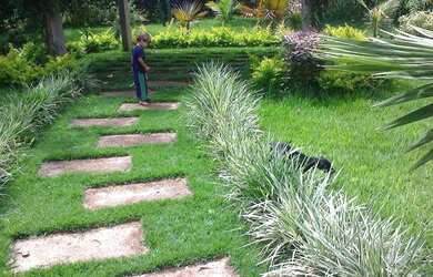 Imagem: A casa possui 4 Dormitórios, 4 Banheiros, 5 Vagas na garagem