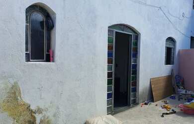 Imagem: A casa possui 2 Dormitórios, 1 Banheiro, 1 Vaga na garagem