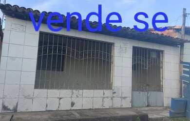 Imagem: A casa possui 3 Dormitórios e 1 Banheiro e está localizado