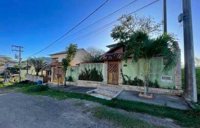 Imagem: A casa possui 4 Dormitórios, 4 Banheiros, 4 Vagas na garagem