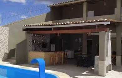 Imagem: A casa possui 4 Dormitórios e 5 Vagas na garagem e está localizado