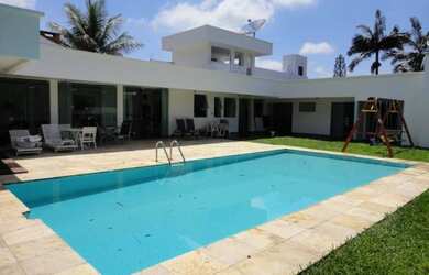 Imagem: A casa possui 5 Dormitórios, 5 Banheiros, 5 Vagas na garagem