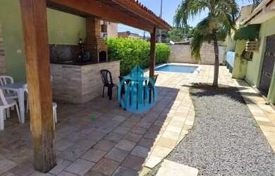 Imagem: A casa possui 5 Dormitórios, 5 Banheiros, 4 Vagas na garagem