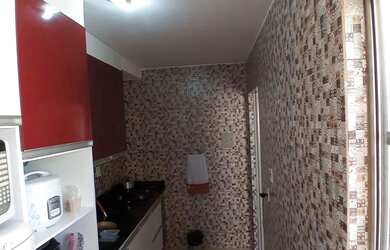 Imagem: O apartamento possui 2 Dormitórios, 1 Banheiro, 1 Vaga na garagem