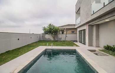 Imagem: Casa de Condomínio - 4 Dormitórios (Suítes) à Venda e Alugar