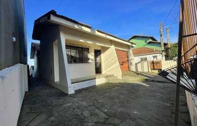 Imagem: A casa possui 4 Dormitórios, 3 Banheiros, 150m² de Área e