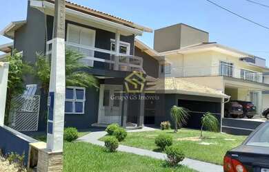 Imagem: A casa possui 3 Dormitórios, 5 Banheiros, 2 Vagas na garagem