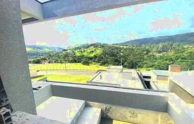 Imagem: A casa possui 4 Dormitórios, 5 Banheiros, 2 Vagas na garagem