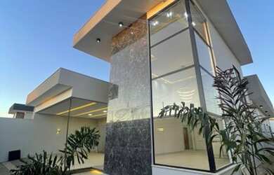 Imagem: A casa possui 4 Dormitórios, 5 Banheiros, 3 Vagas na garagem