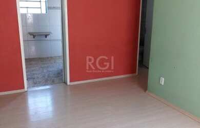 Imagem: O apartamento possui 3 Dormitórios, 1 Banheiro, 1 Vaga na garagem