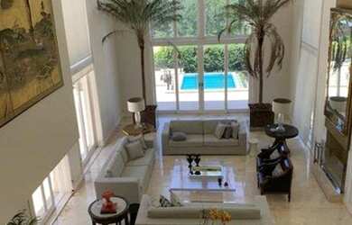 Imagem: A casa em condomínio possui 4 Dormitórios, 4 Banheiros, 5