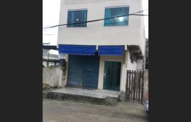 Imagem: A casa possui 2 Dormitórios e 1 Banheiro e está localizado