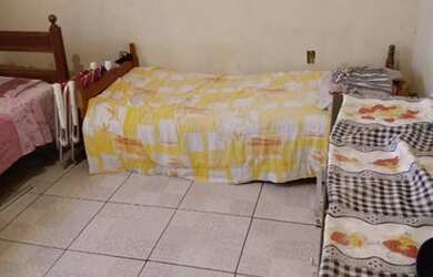 Imagem: A casa possui 2 Dormitórios, 2 Banheiros, 3 Vagas na garagem