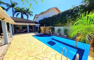 Imagem: A casa em condomínio possui 3 Dormitórios, 3 Banheiros, 2