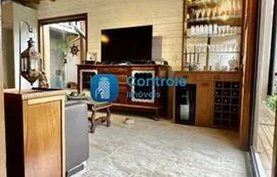 Imagem: A casa possui 3 Dormitórios, 4 Banheiros, 2 Vagas na garagem