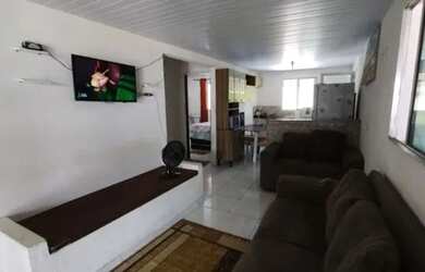 Imagem: A casa possui 3 Dormitórios, 1 Banheiro, 1 Vaga na garagem