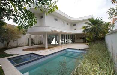 Imagem: A casa em condomínio possui 4 Dormitórios, 5 Banheiros, 4