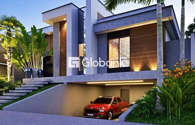 Imagem: A casa possui 3 Dormitórios, 2 Banheiros, 2 Vagas na garagem