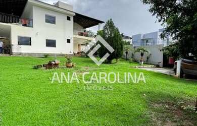 Imagem: A casa possui 5 Dormitórios, 3 Banheiros, 2 Vagas na garagem