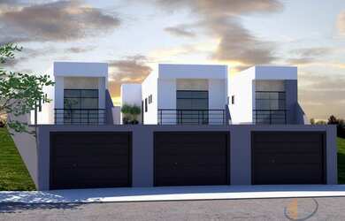 Imagem: A casa possui 3 Dormitórios, 1 Banheiro, 2 Vagas na garagem