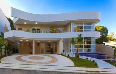 Imagem: A casa em condomínio possui 5 Dormitórios, 5 Banheiros, 5