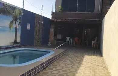 Imagem: A casa possui 3 Dormitórios, 1 Banheiro, 2 Vagas na garagem