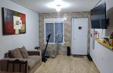 Imagem: A casa possui 2 Dormitórios, 3 Banheiros, 2 Vagas na garagem