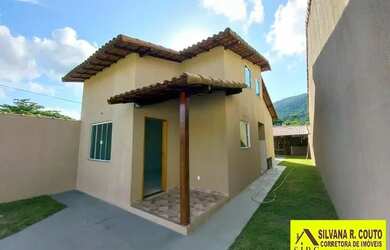 Imagem: A casa possui 3 Dormitórios, 3 Banheiros, 2 Vagas na garagem