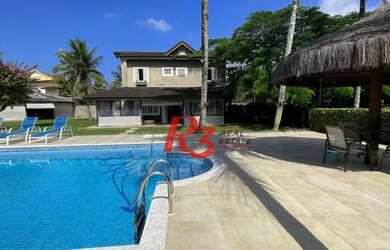 Imagem: A casa possui 5 Dormitórios, 5 Banheiros, 5 Vagas na garagem