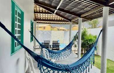 Imagem: A casa possui 4 Dormitórios, 4 Banheiros, 3 Vagas na garagem