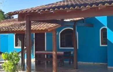 Imagem: A casa possui 4 Dormitórios, 3 Banheiros, 5 Vagas na garagem