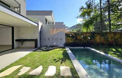 Imagem: A casa em condomínio possui 4 Dormitórios, 5 Banheiros, 2