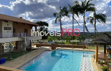 Imagem: A casa em condomínio possui 5 Dormitórios, 5 Banheiros, 5