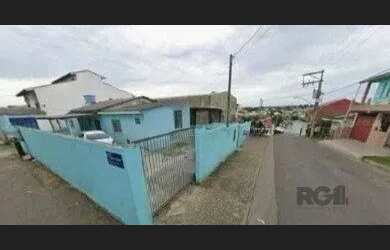 Imagem: A casa possui 4 Dormitórios, 3 Banheiros, 3 Vagas na garagem