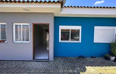 Imagem: A casa possui 2 Dormitórios, 1 Banheiro, 1 Vaga na garagem