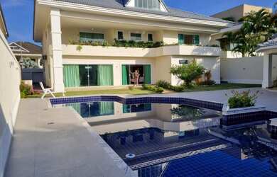 Imagem: A casa em condomínio possui 5 Dormitórios, 5 Banheiros, 4