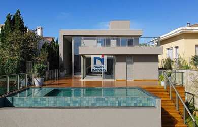 Imagem: A casa em condomínio possui 4 Dormitórios, 5 Banheiros, 4