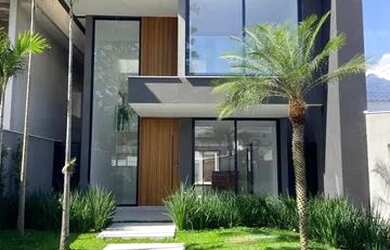 Imagem: A casa em condomínio possui 4 Dormitórios, 5 Banheiros, 4