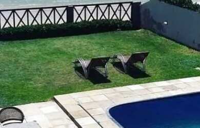 Imagem: A casa possui 5 Dormitórios, 5 Vagas na garagem e está localizado