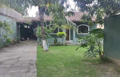 Imagem: A casa possui 2 Dormitórios, 1 Banheiro, 3 Vagas na garagem