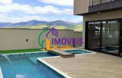 Imagem: A casa em condomínio possui 3 Dormitórios, 3 Banheiros, 2