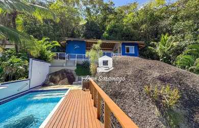 Imagem: A casa em condomínio possui 4 Dormitórios, 5 Banheiros, 2