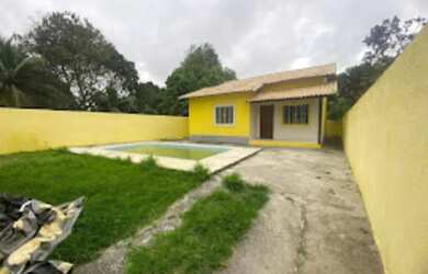 Imagem: A casa possui 3 Dormitórios, 1 Banheiro, 4 Vagas na garagem