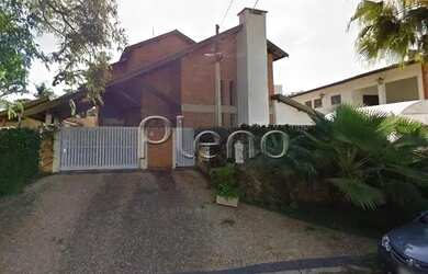 Imagem: A casa possui 5 Dormitórios, 4 Banheiros, 4 Vagas na garagem