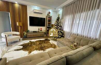 Imagem: A casa em condomínio possui 5 Dormitórios, 5 Banheiros, 410m²