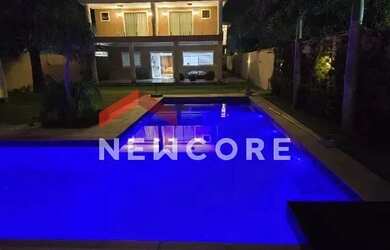 Imagem: A casa possui 3 Dormitórios, 5 Banheiros, 3 Vagas na garagem