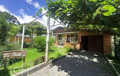 Imagem: A casa possui 2 Dormitórios, 1 Banheiro, 1 Vaga na garagem