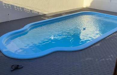 Imagem: A casa possui 5 Dormitórios, 4 Banheiros, 3 Vagas na garagem