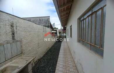 Imagem: A casa à venda possui 3 Dormitórios, 2 Banheiros, 3 Vagas